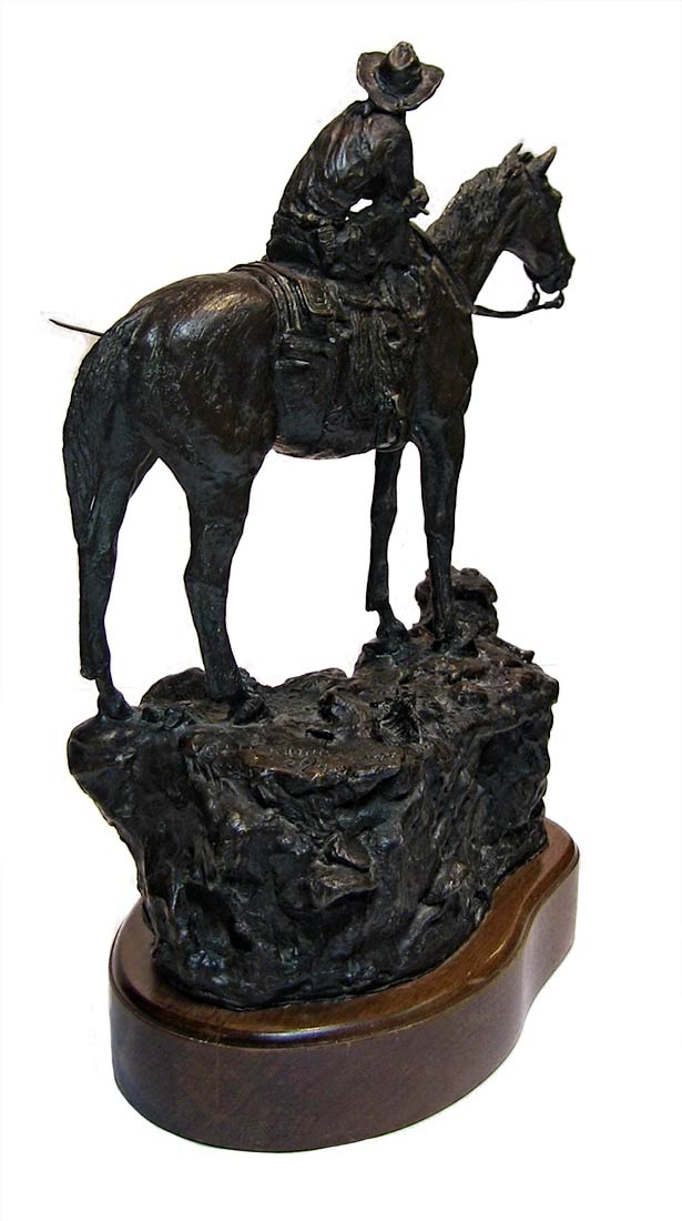 A western bronze sculpture horse and rider a sculpture by Jasper D'Ambrosi titled Holdin Herd