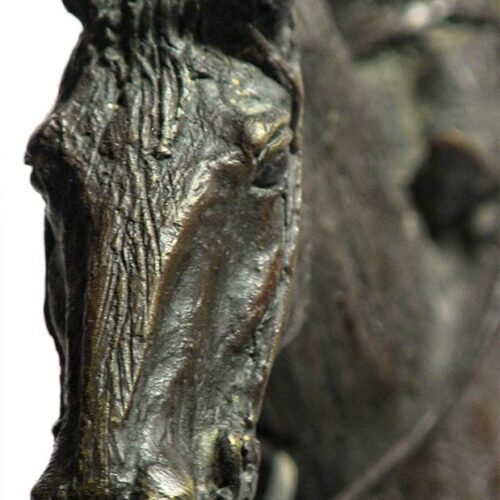 A western bronze sculpture horse and rider a sculpture by Jasper D’Ambrosi titled Holdin Herd