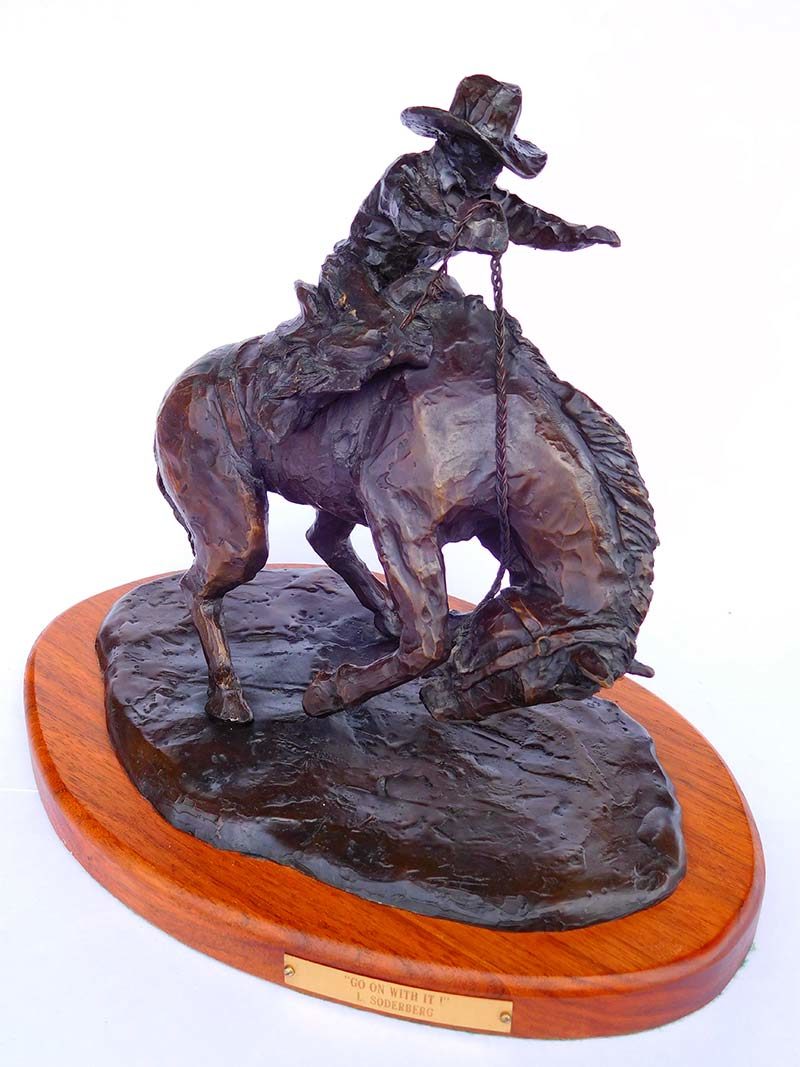 'Go On With It' Limited edition, a cowboy on bucking horse bronze sculpture by L. Soderburg available from Sculpture Collector