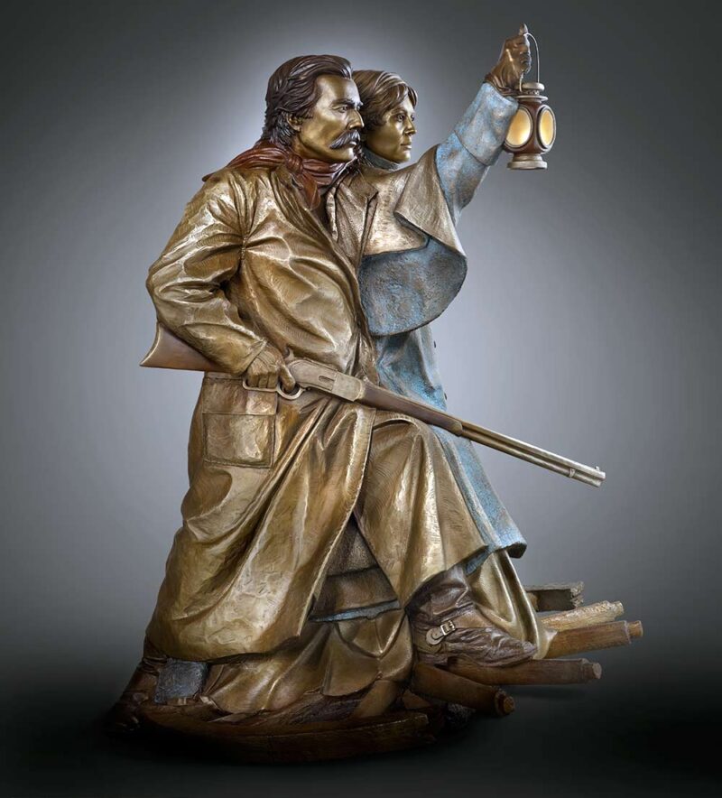 The Lighted Lantern a life-size bronze sculpture of Pioneers by James Muir