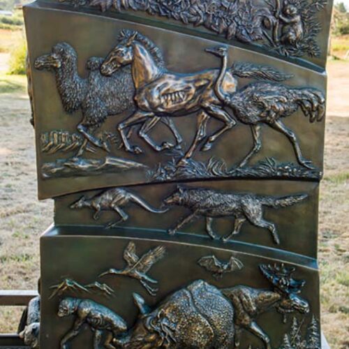 Discovering Our Wild World, large bronze animal-learning sculpture by John Bonnett Wexo