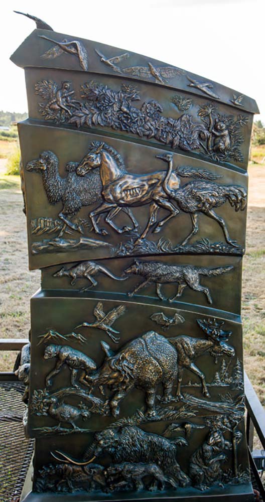 Discovering Our Wild World, large bronze animal-learning sculpture by John Bonnett Wexo