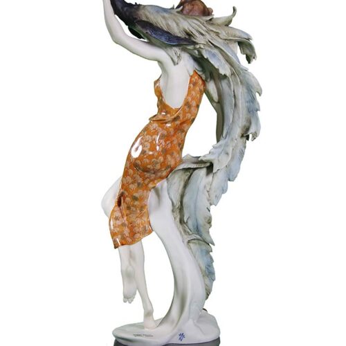 sculpture in porcelain Lady and Peacock by Giuseppe Armani