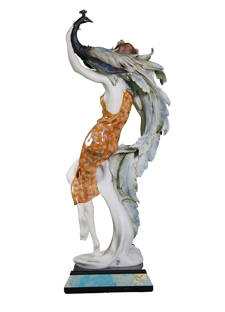 sculpture in porcelain Lady and Peacock by Giuseppe Armani