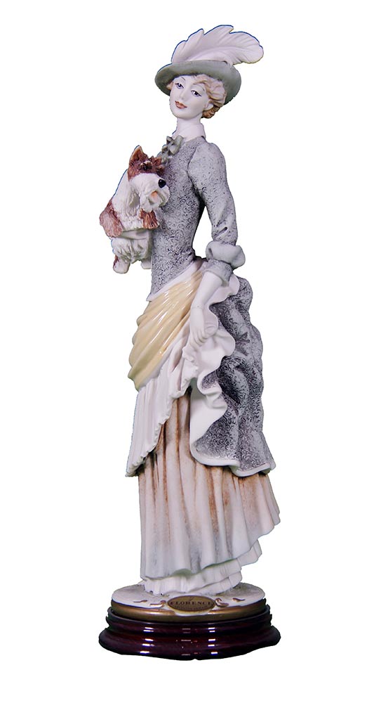 Sculpture in porcelain by Giuseppe Armani – Eloise holding her dog