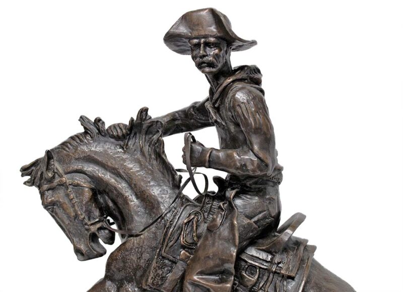 Remington The Cowboy a nicely done restrike of this famous bronze sculpture