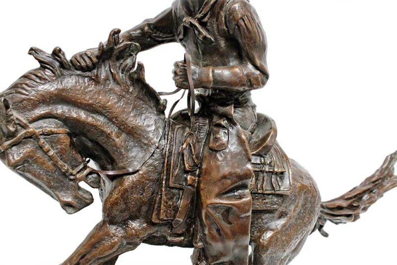 Remington The Cowboy a nicely done restrike of this famous bronze sculpture