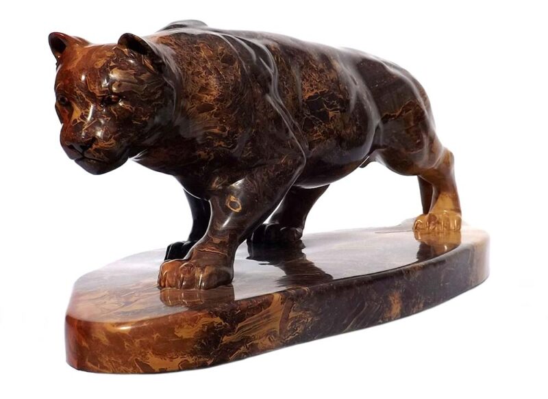 A Carved Stone Sculpture titled Stealth (Mountain Lion) by Gerald Sandau