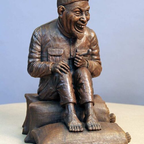 A Limited Edition Bronze Sculpture titled Old Asian Man Enjoying a Pipe by Chris Towle
