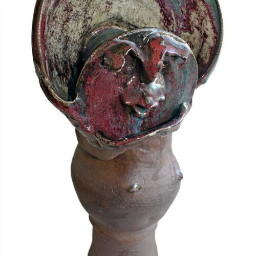 A Porcelain-Stoneware Bird Face Woman by Peter Daniels