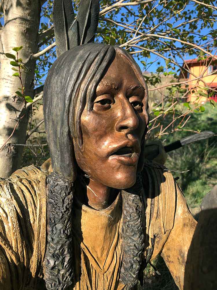 Cool from the Creek a life-size Native American bronze sculpture by noted sculptor Marie Barbera