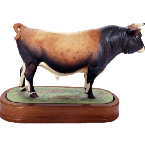 Jersey Bull a hand painted porcelain sculpture by noted artist Doris Lindner