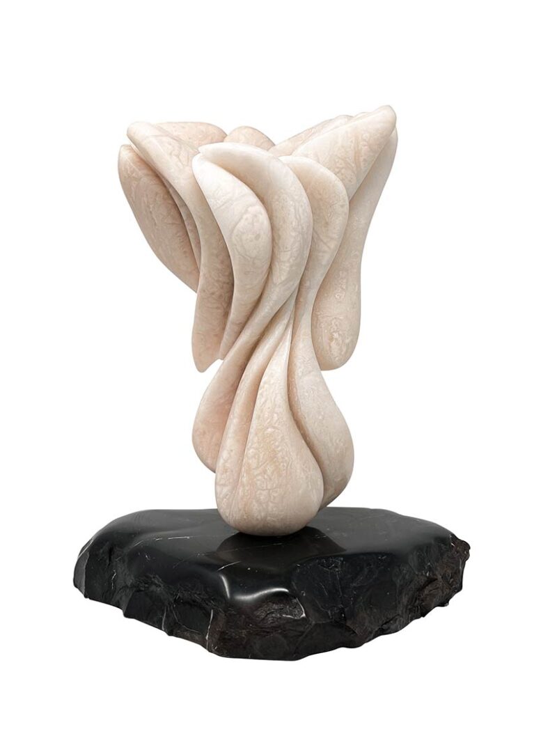 A unique stone sculpture by noted artist Michele Chapin titled Moon Flower