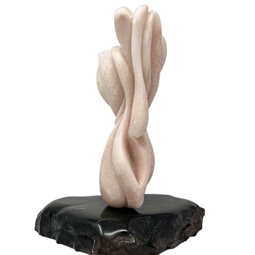 A unique stone sculpture by noted artist Michele Chapin titled Moon Flower