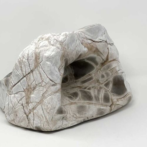 An elegant stone sculpture by noted sculptor-artist Michele Chapin
