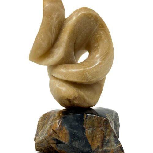 The Time Traveler carved Alabaster stone sculpture by noted sculptor-artist Michele Chapin