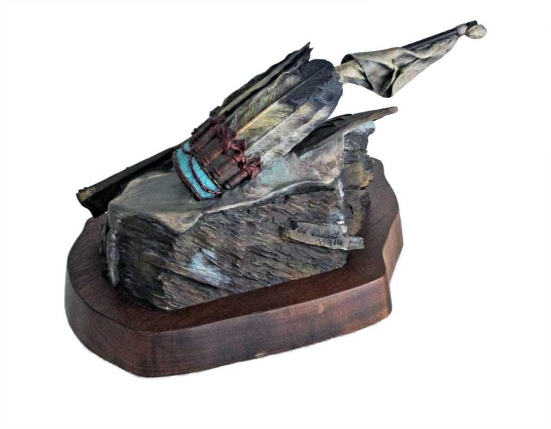 Defeat at Bear Mountain a limited edition bronze sculpture of discarded battle gear of Chief Joseph by Ed Swena