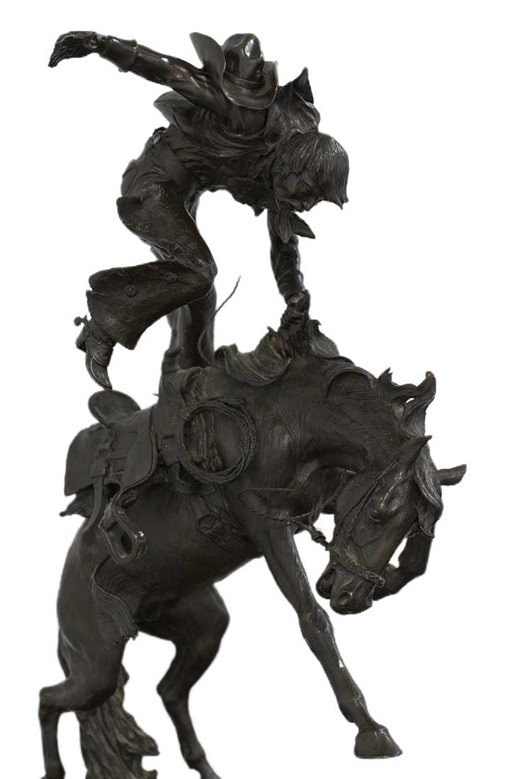 Horseplay a bronze bucking bronco and rider sculpture by noted sculptor-artist Elie Hazak