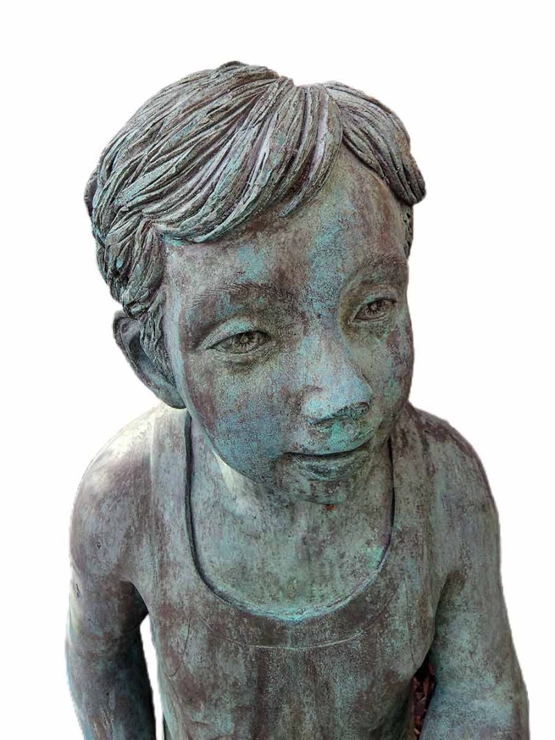 A growing Boy holding a water hose by Elite by Henri like he is watering the the garden in bronze at an attractive price.