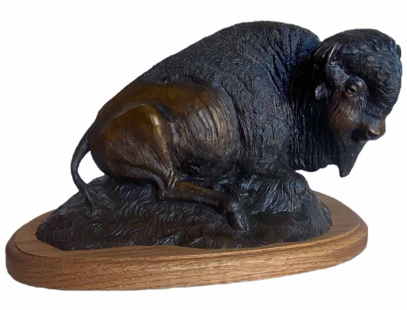 Bison Lazing on the Ground - Limited edition, bronze Bison sculpture by noted sculptor-artist R. Rousu