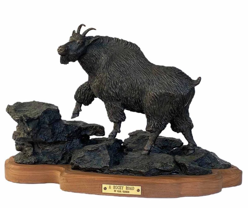 Bronze Mountain Goat sculpture by the late gifted sculptor-artist Carl Wagner, titled "A Rocky Road"