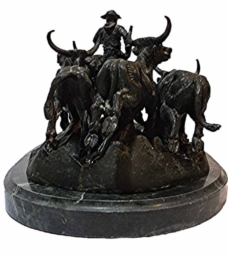 A nice bronze restrike example of Stampede a bronze sculpture by Frederic Remington