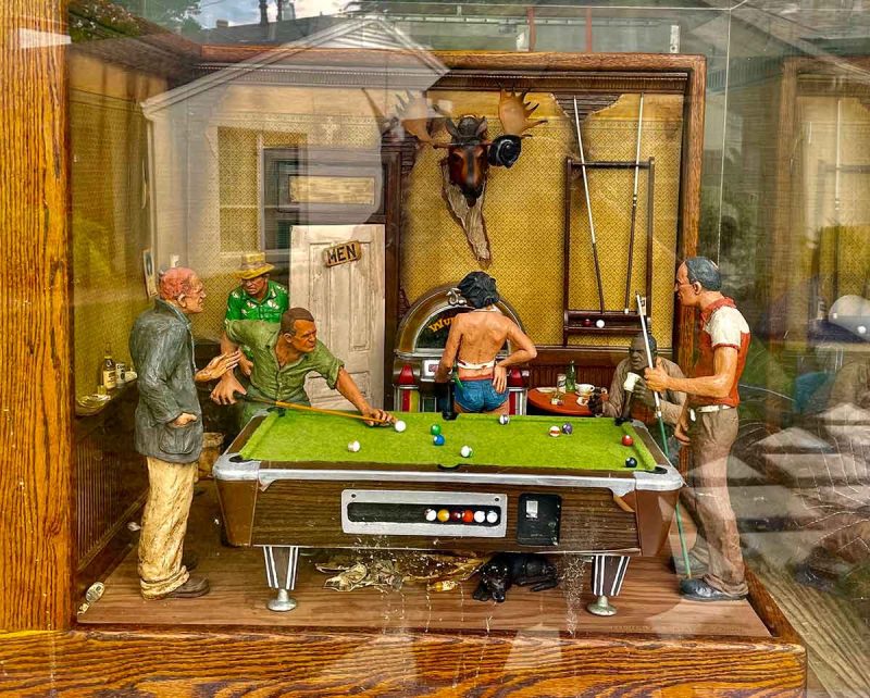 Pool Hall Blues a bronze diorama of a people shooting pool by Michael Garman