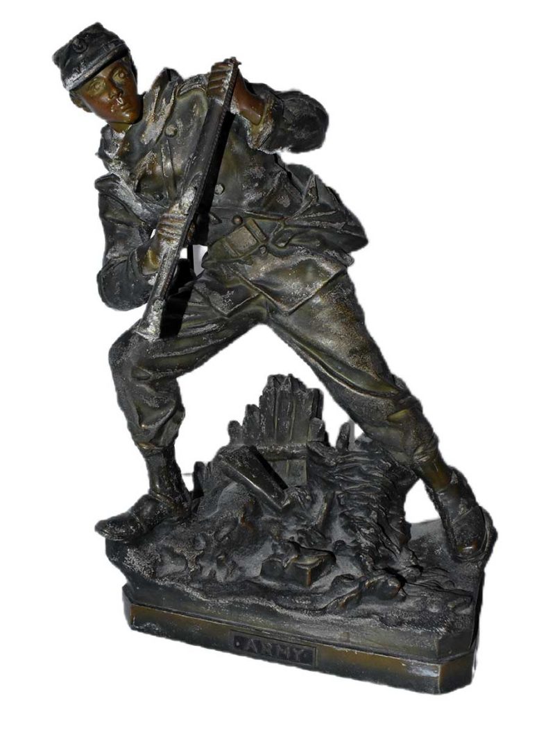 Figurative Army soldier in the ready stance. The artist is unknown. The bronze sculpture is titled Army.