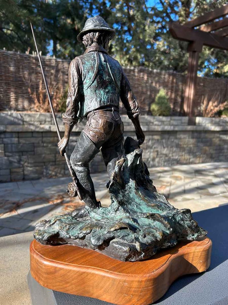 A limited edition No. 1 of 30 bronze sculpture of a fisherman "Oceans Farewell" by noted sculptor artist Ken Scott