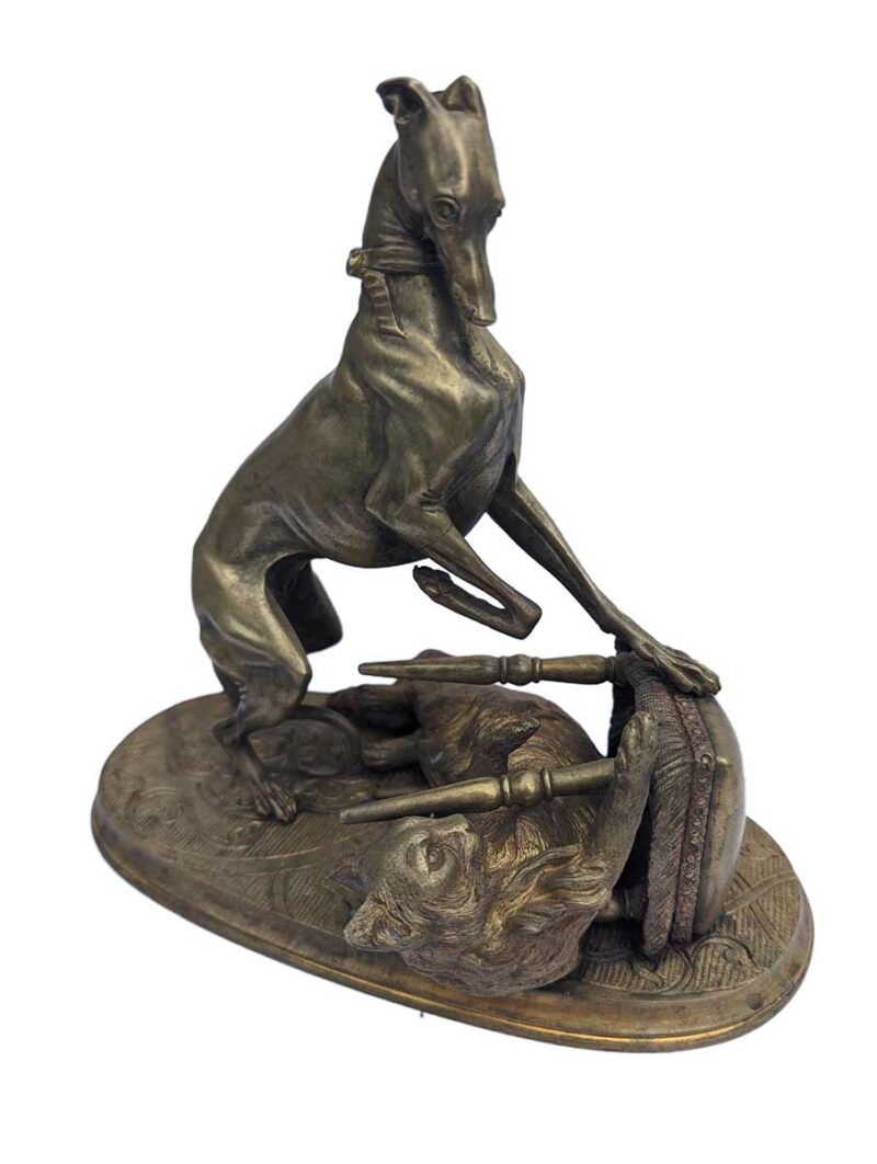 "Playful Pets" a bronze sculpture includes a greyhound or whippet and a cat, depicted in a dynamic scene with an overturned stool by LeBlanc Frères'