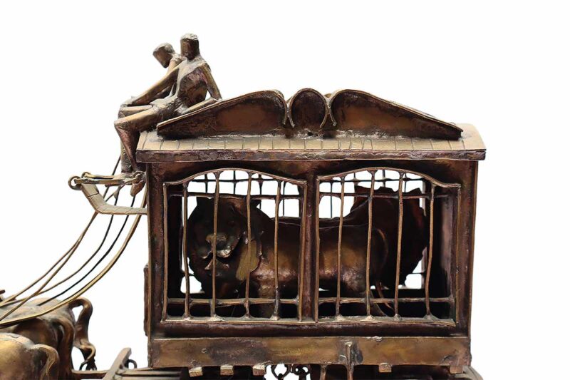 Circus Wagon a unique one of a kind welded bronze sculpture. A mesmerizing portrayal od a Circus Wadgon it's horses, drivers, and tweo caged lions reoresenting a time past. They all play a part! This unique welded bronze Circus Wagon is by the noted sculptor-artist Leonard DeLonga. Circus Wagon so aptly titled! A great price for a truly detailed and decorative piece! Available now from SculptureCollector.com where unique and creative sculpture is bought, sold, and brokered in a secure and private manner globally.