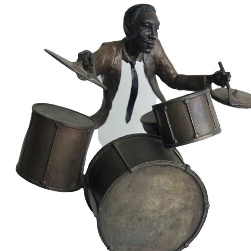A bronze sculpture titled "Jazz Drummer" by Mark Hopkins one of the pieces of the Jazz Musicians Sculpture Group by Mark Hopkins