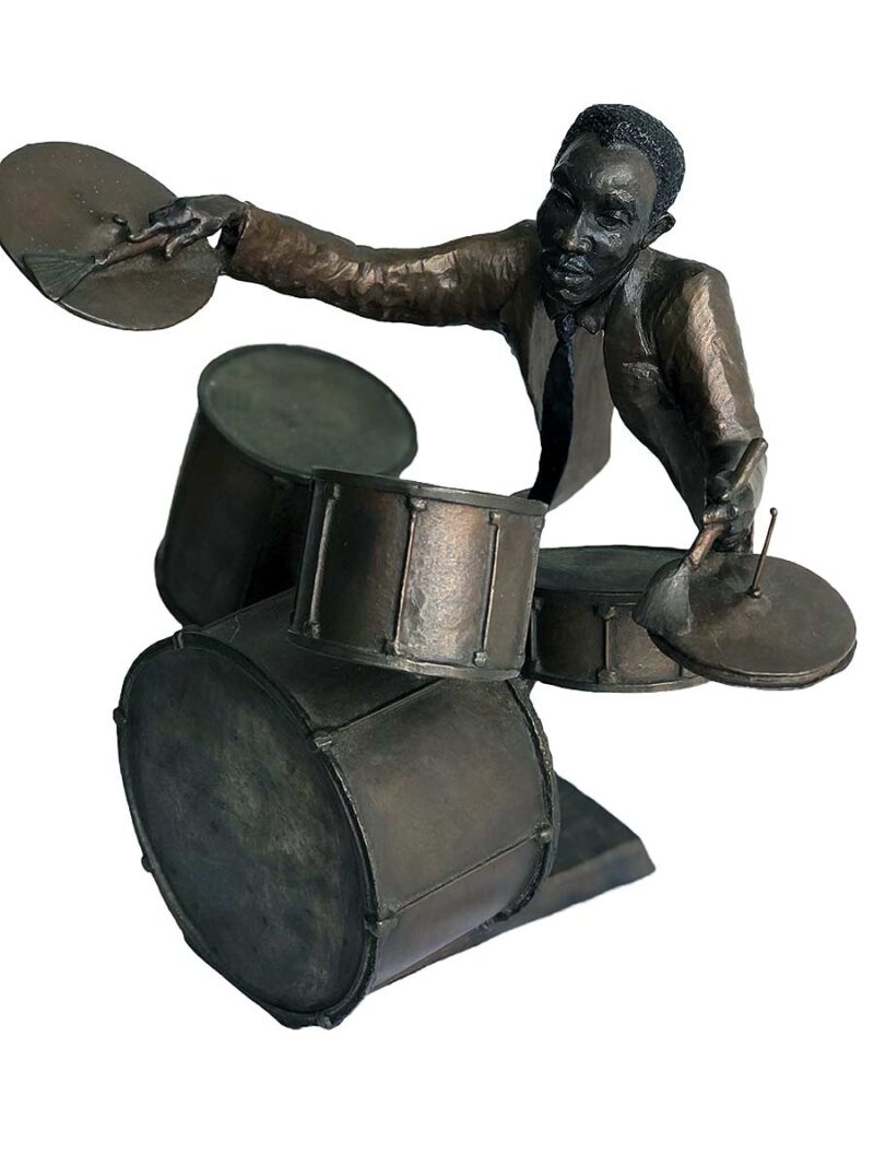 A bronze sculpture titled "Jazz Drummer" by Mark Hopkins one of the pieces of the Jazz Musicians Sculpture Group by Mark Hopkins