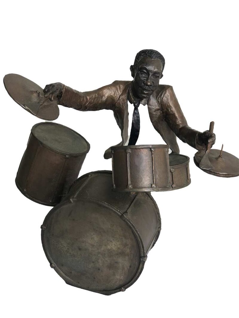 A bronze sculpture titled "Jazz Drummer" by Mark Hopkins one of the pieces of the Jazz Musicians Sculpture Group by Mark Hopkins