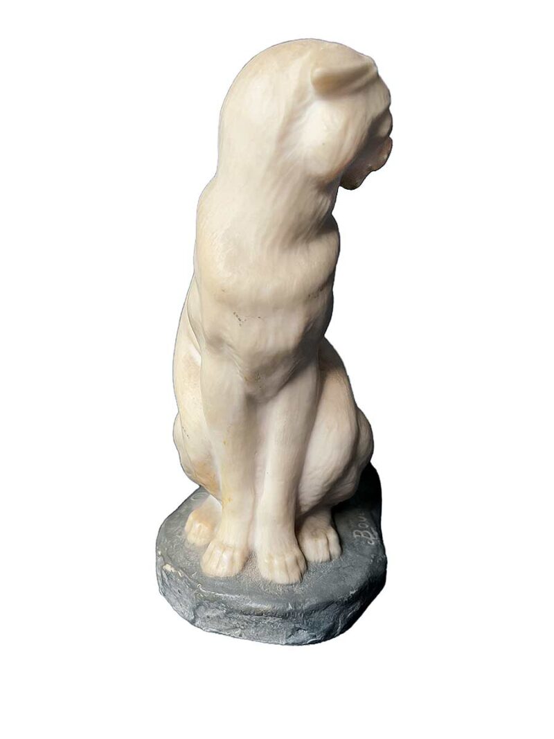 bronze sculpture titled "Cougar"(ttb) by noted sculptor-artist JL Boulton one of his many nicely carved Alabaster sculptures.