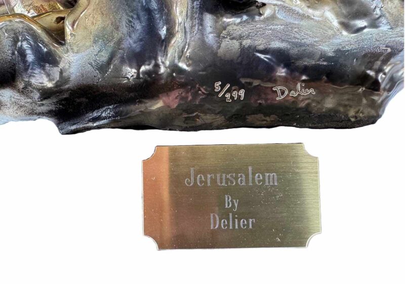 DeLier "Jerusalem" Patinated Bronze Sculpture, depicting Moses holding Jerusalem in his hands, signed and numbered edition "49/299" under left shoulder, mounted on white stone base.