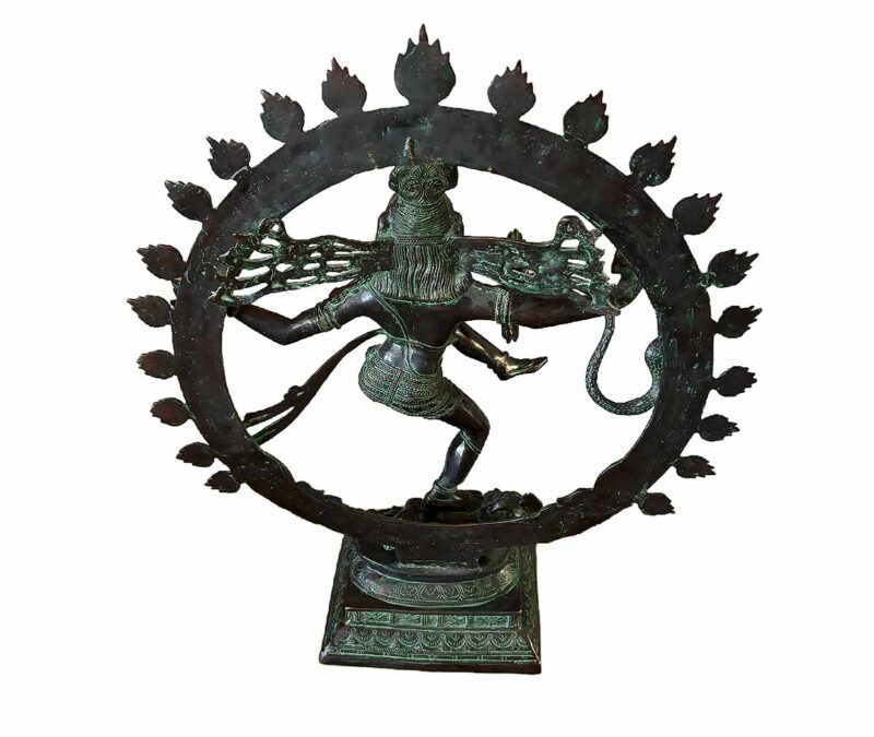 Nataraja in his cosmic dance form in a circle of fire. One of a kind statue depicting incredible details of the attributes of Nataraja using the lost wax method. Crafted by expert South Asian artisans. Measures an impressive 27" W x 11" x 34" T