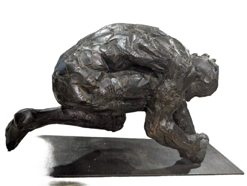 A figurative male bronze sculpture titled "Male Trans-figure Maquette XVI" equisitly done by artist- sculptor Dylan Lewis. This sculpture is available now from SculptureCollector.com offering fine and creative sculpture to the world.