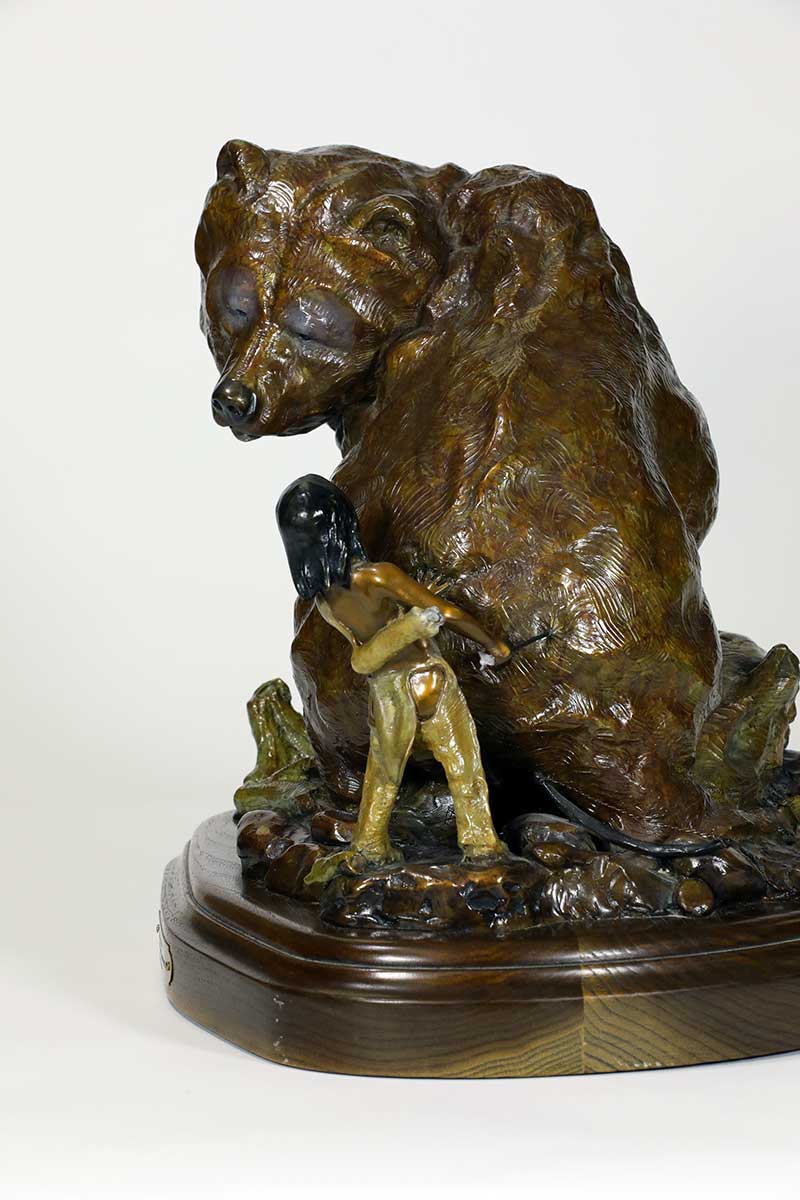 Noted bronze sculptor Walt Horton, known for his numerous Bear sculptures, some whimsical like this one titled "Redemption". This playful interaction between the young child and the big bear! Available now on SculptureCollector.com, the premier platform for purchasing or reselling creative sculptures securely and privately.