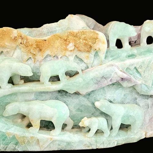 A rarely available carved green flourite sculpture that is recognized mineral collected worldwide. A hand-carved green fluorite sculpture depicting a glacier scene with polar bears. Available now on SculptureCollector.com, the premier platform for purchasing or reselling creative sculptures securely and privately.