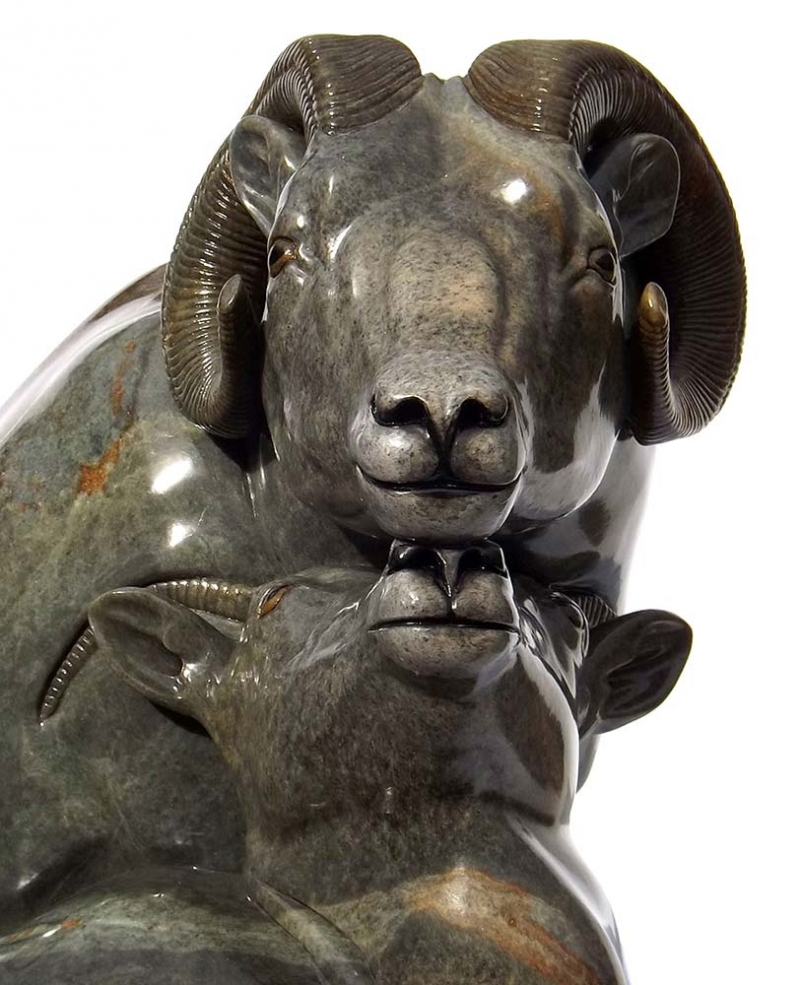 A Carved Stone Sculpture titled High Country Moment (Big Horn Sheep) by Gerald Sandau