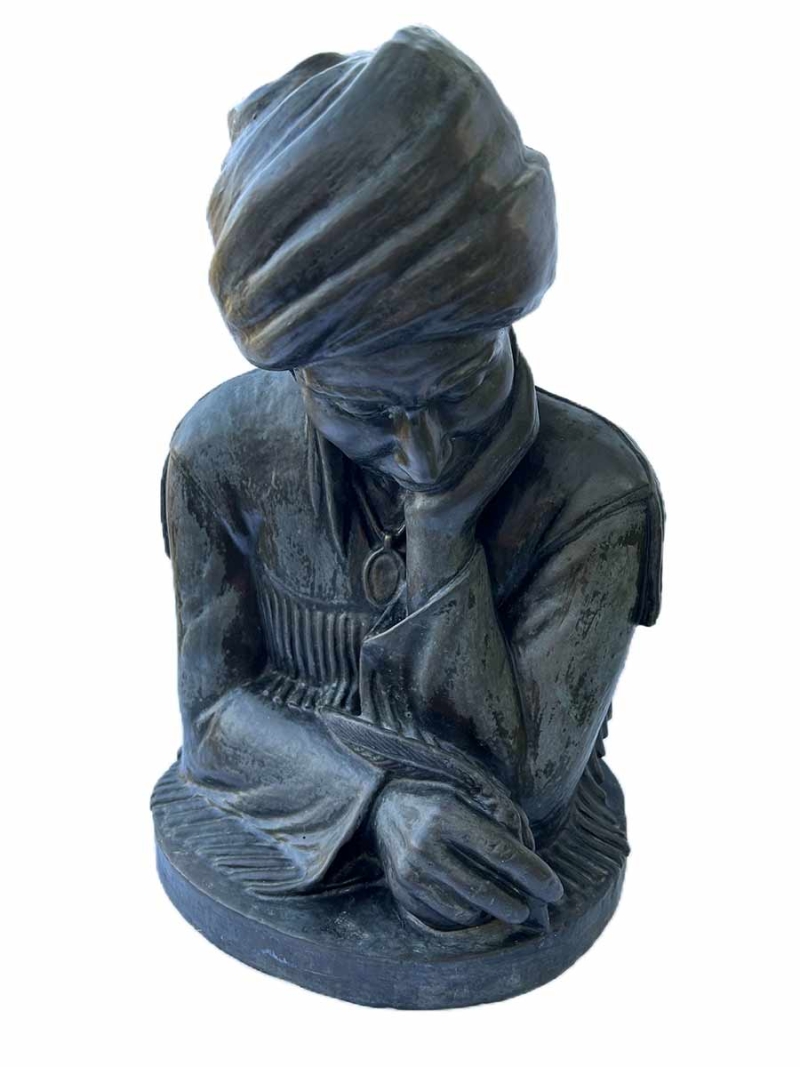 Sequoyah a limited edion bronze Cherokee sculpture representing the creastion of the written form of Cherokee language by noted tribal artisan Willard Stone