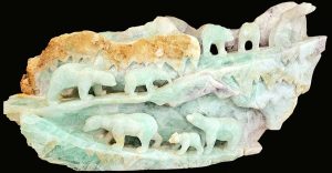 Hand Carved Green Flourite Sculpture depicring a Glacier Scene with Polar Bears A rarely available carved green flourite sculpture that is recognized mineral collected worldwide. A hand-carved green fluorite sculpture depicting a glacier scene with polar bears. Available now on SculptureCollector.com, the premier platform for purchasing or reselling creative sculptures securely and privately.